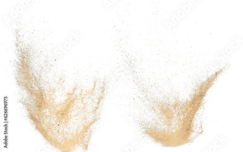 Sand flying explosion, Golden sand wave explode. Abstract sands cloud fly. Yellow colored sand splash throwing in Air. White background Isolated high speed shutter, throwing freeze stop motion