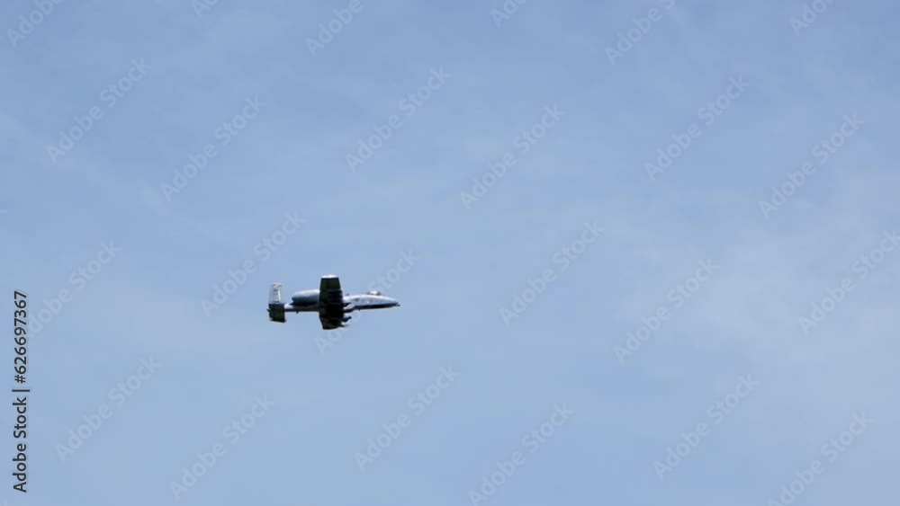 Modern fighter jet an a10 Thunderbolt air force attack plane in flight, slow motion Modern fighter jet an a10 Thunderbolt air force attack plane in flight, slow motion