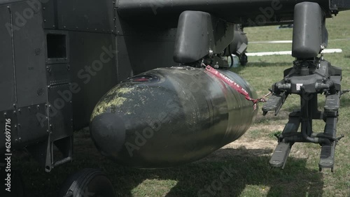 Missle bomb on Apache attack helicopter chopper on display at the Army Aviation Centre