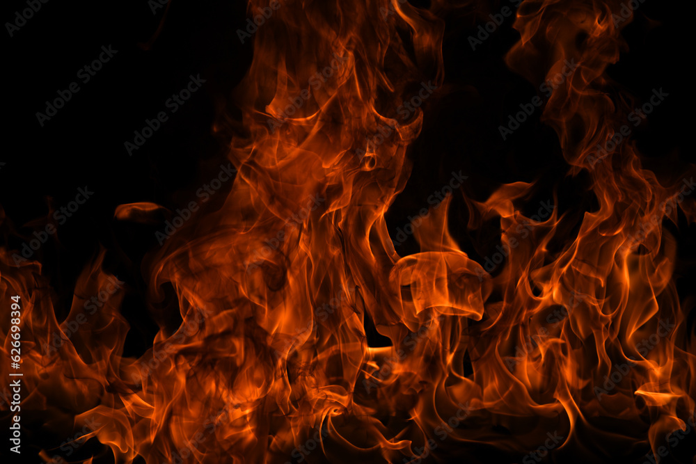 Fire flames on black background. Fire burn flame isolated, abstract texture. Flaming effect with burning fire.