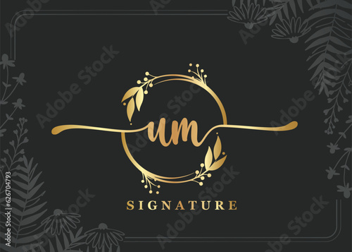 luxury gold signature initial um logo design isolated leaf and flower photo