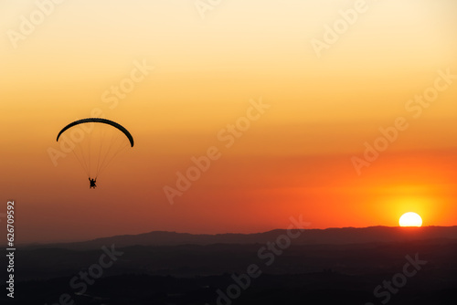 Paragliding during sunset. Pedra Grande, located in Atibaia, Brazil