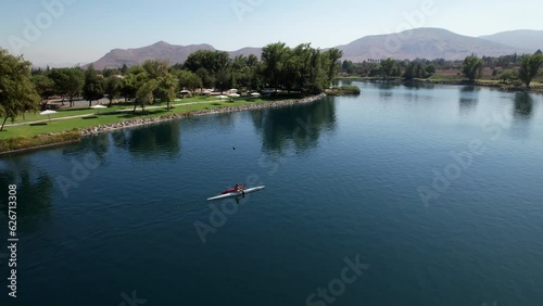 Man kayaking on lagoon Piedra Roja in Chicureo Santiago Chile photo