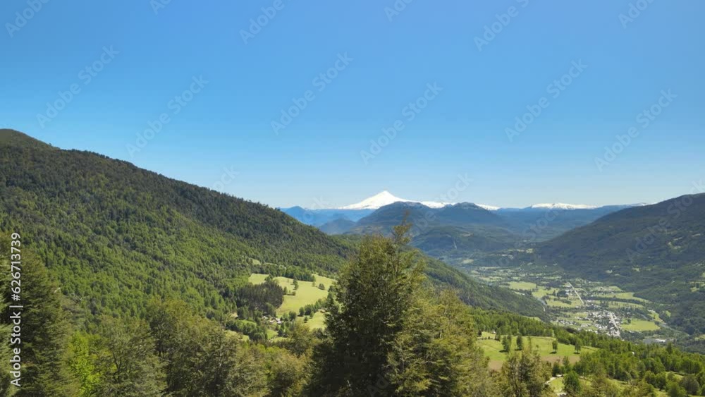 Drone view of Chilean flag and Villarica volcano in the beginning of route to Heart lagoon laguna corazon in Chile. Drone view of Chilean flag and Villarica volcano in the beginning of route to Heart lagoon laguna corazon in Chile.