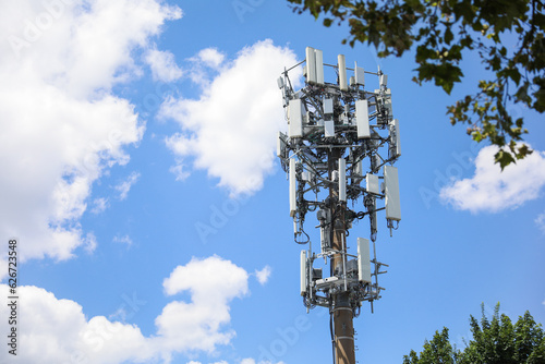 Telecommunication tower's radio antenna symbolizes global communication, progress, wireless networks, and technological advancement photo