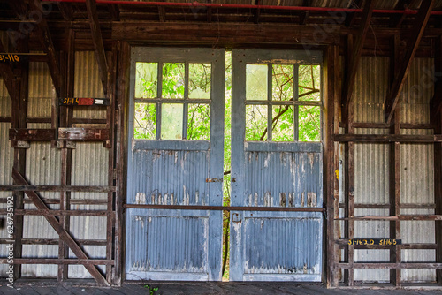 Double doors, barn doors, abandoned, broken, barn, unit, spare machinery storage, interior