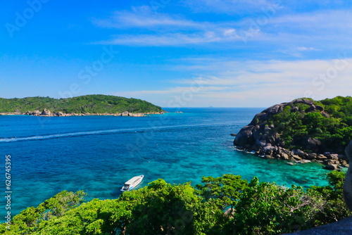 Fototapeta Naklejka Na Ścianę i Meble -  Scenic sea vista with sparkling azure waters from the top of Sailing rock cliff in Similan Islands, Andaman Sea off Phuket, Thailand