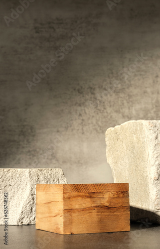 Rough stone and wooden box with sunlight from window on concrete wall and floor background,Copy space for product display