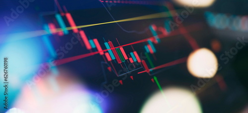 Businessman hand working on analyzing investment charts.  financial and investment products