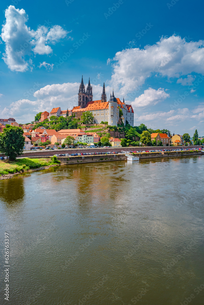 Famous ancient Meissen Castle, Fortress and Cathedral near Dresden at Elbe river. Sunny summer day with blue sky and sunset colors