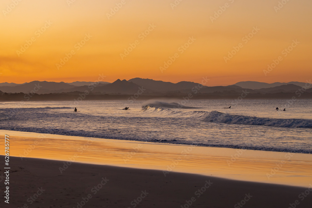 Sunset beach views across Main Beach in Byron Bay, New South Wales, Eastern Australia