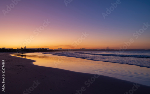 Sunset beach views across Main Beach in Byron Bay  New South Wales  Eastern Australia