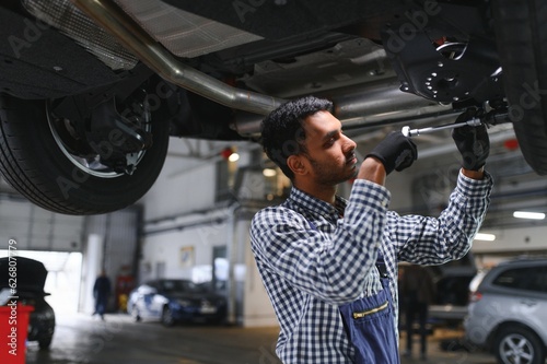 Handsome Indian Auto Mechanic at car servise