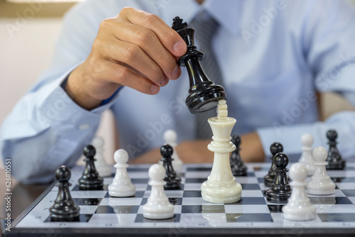 hand moves chess with strategy and tactic to win enemy, play battle on board game, business opportunity competition strategic challenge concept