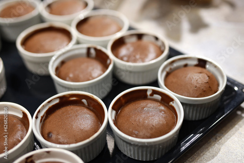 cooking chocolate desserts in molds in the kitchen