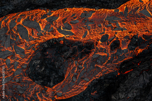 Photographie Aerial view of the texture of a solidifying lava field, close-up