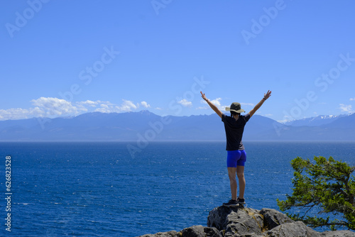Young woman on the south shore of Vancouver Island in British Columbia  Canada.