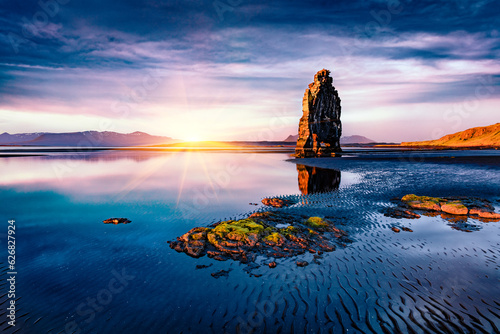 Dramatic summer view of huge basalt stack Hvtserkur on the eastern shore of the Vatnsnes peninsula. Picturesque sunrise in Iceland, Europe. Beauty of nature concept background..