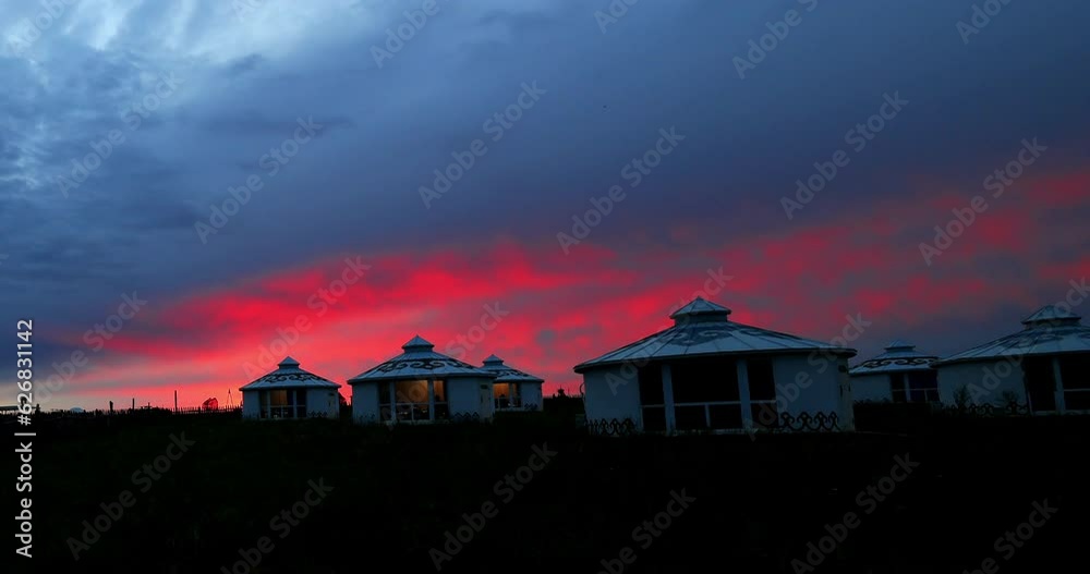 Sunset glow over Hulunbuir grassland, time lapse.Hulunbuir Grassland, is a world famous natural pasture, is one of the world's four grasslands, known as the world's best grassland. Sunset glow over Hulunbuir grassland, time lapse.Hulunbuir Grassland, is a world famous natural pasture, is one of the world's four grasslands, known as the world's best grassland.