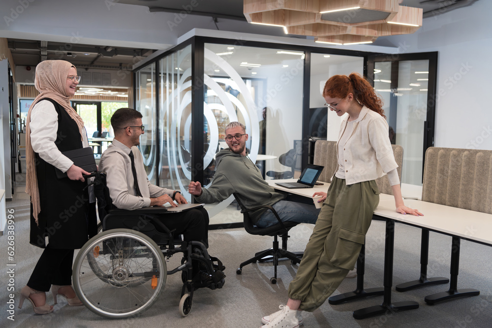 Young group of business people brainstorming together in a startup space, discussing business projects, investments, and solving challenges. Young group of business people brainstorming together in a startup space, discussing business projects, investments, and solving challenges.