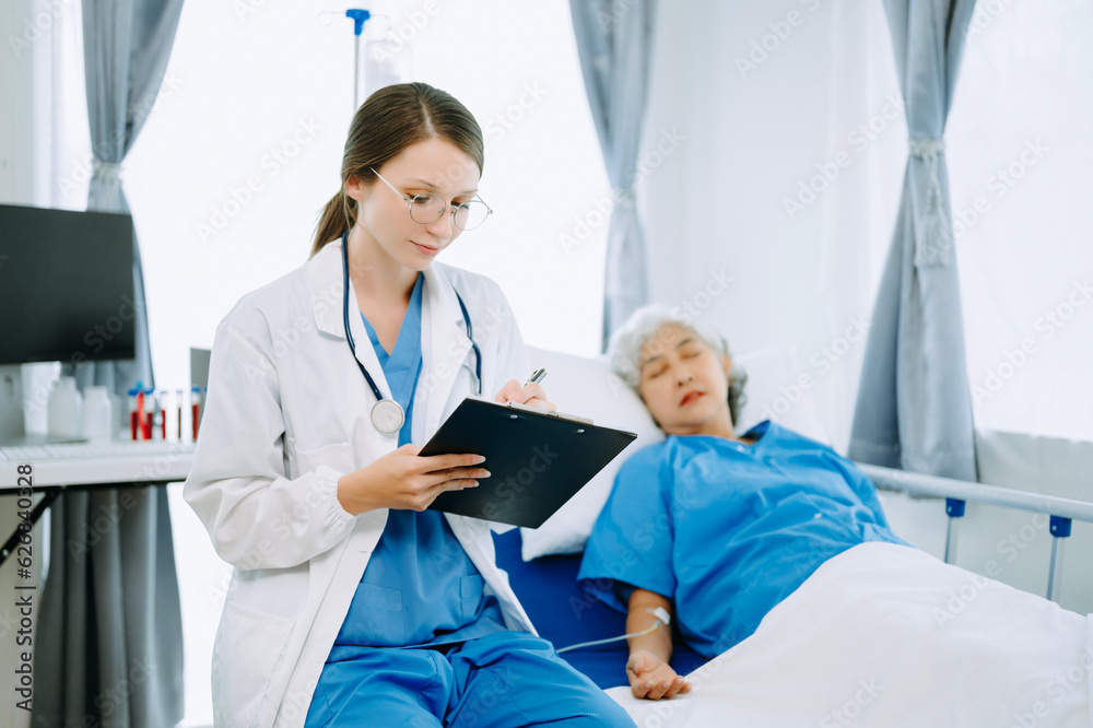 Fototapeta premium Woman Doctor and patient discussing something while sitting on examination bed in modern clinic or hospital . Medicine and health care concept.