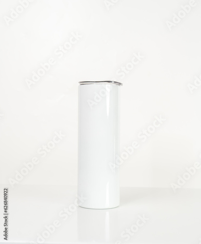 With understated elegance, a mockup image highlights the timeless appeal of a wine tumbler arranged simply