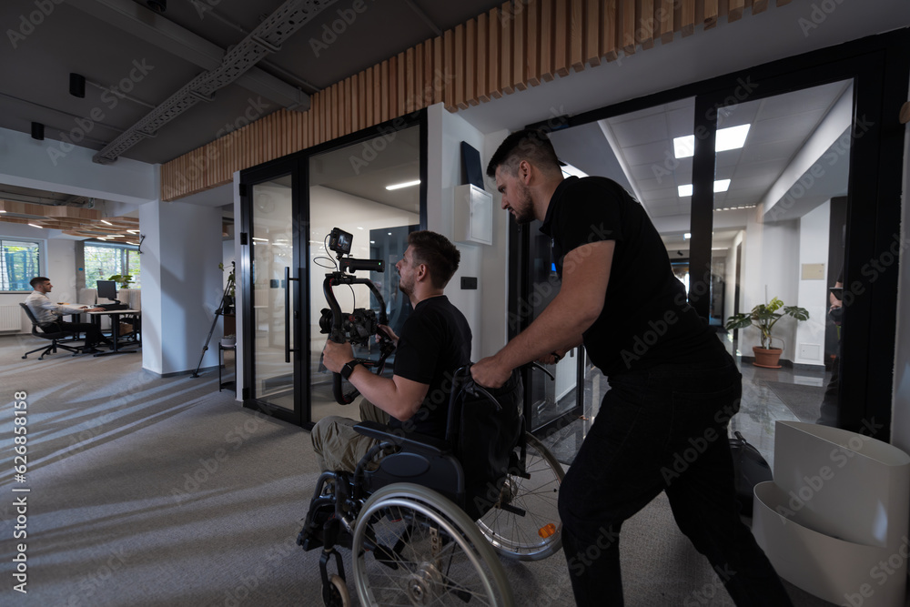 In a modern office, a professional team of videographers captures the essence of creativity and innovation as they film a group of young entrepreneurs, symbolizing collaboration and ambition in the In a modern office, a professional team of videographers captures the essence of creativity and innovation as they film a group of young entrepreneurs, symbolizing collaboration and ambition in the
