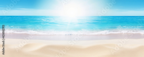Sand beach and clear blue sea under the heat of the sun  with defocused background. Summer vacation mood banner.