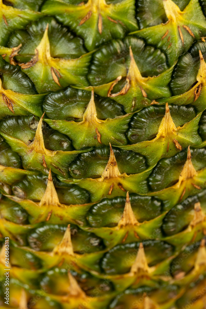 Ripe whole pineapple with green-yellow peel Ripe whole pineapple with green-yellow peel