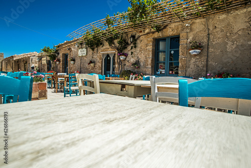 Fototapeta Naklejka Na Ścianę i Meble -  The charming town of Marzamemi in Sicily. Summer view of the streets and the main square.