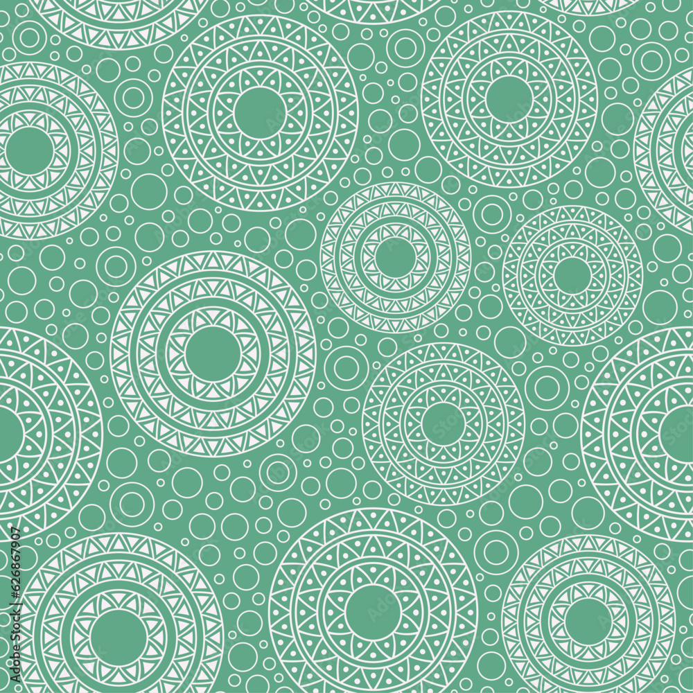Pattern of white rings on green background