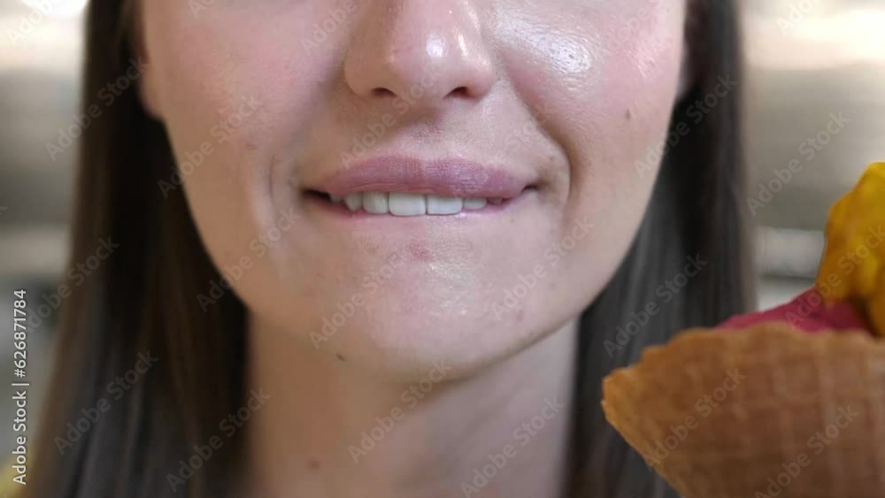Young woman eating tasty ice cream in cafe, closeup