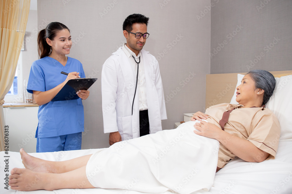 Specialist doctor man and nurse explaining and check with elderly patient in hospital, medical and sick, diagnostic with report medical and healthcare, examining disease and ill, senior and unwell. Specialist doctor man and nurse explaining and check with elderly patient in hospital, medical and sick, diagnostic with report medical and healthcare, examining disease and ill, senior and unwell.
