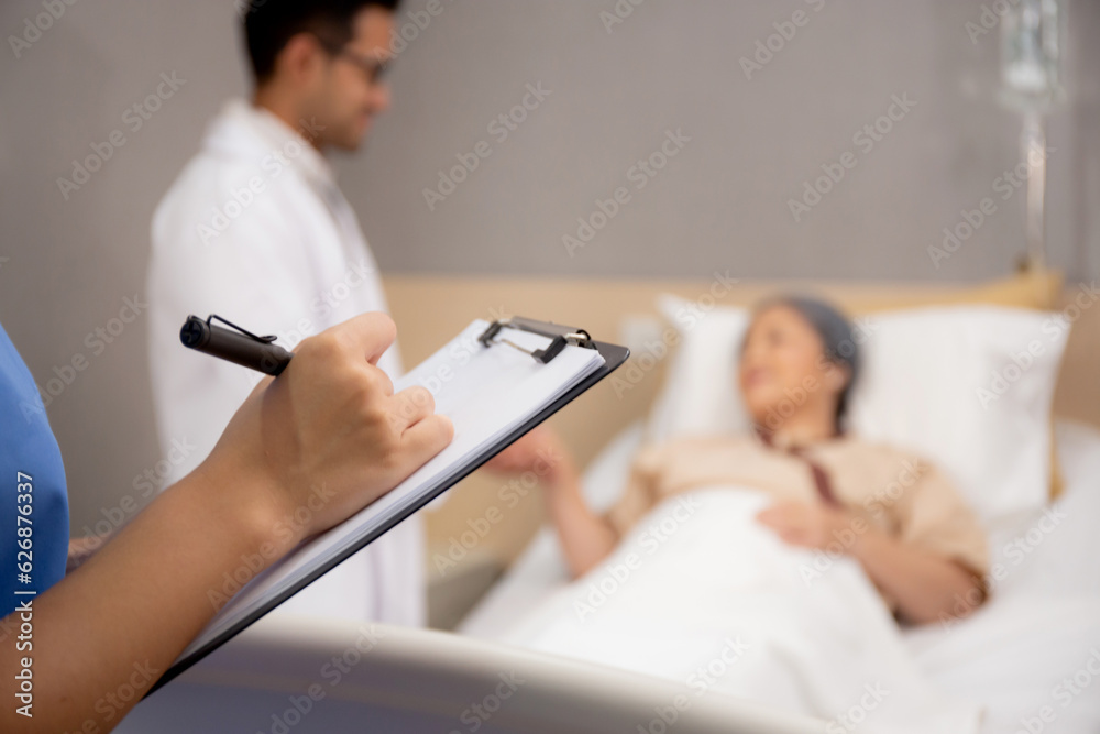Nurse check and writing document on clipboard with elderly patient in hospital, medical and sick, diagnostic with report medical and healthcare, examining disease and ill, senior and unwell.