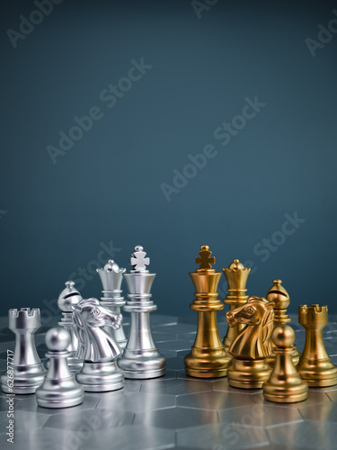 Canvas Print Set of golden and silver chess pieces element, king, queen rook, bishop, knight, pawn standing on hexagon pattern chessboard on blue background