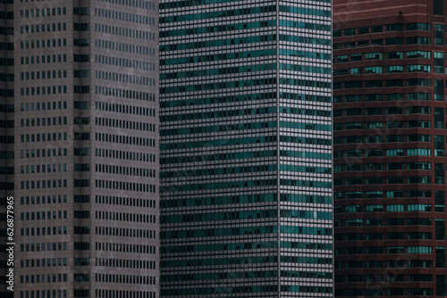 three skyscrapers in Manhattan from the Brooklyn bridge