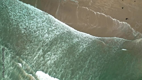 Waves hitting the beach