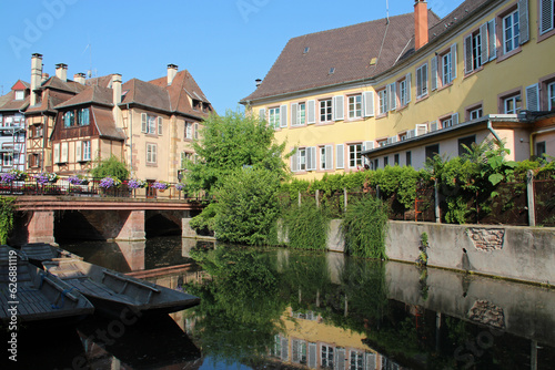 old buildings and lauch river in colmar in alsace (france)
