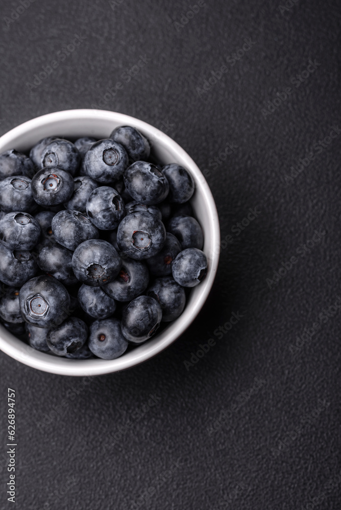 Delicious fresh sweet blueberries in a ceramic bowl. Vegan food