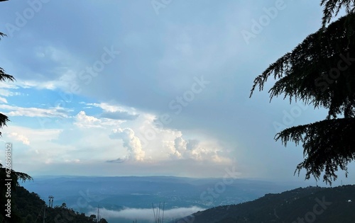 time clouds over the mountains