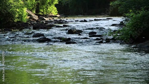 Kishacoquillas Creek flowing thru Yeartown downstream to the Juniata River at Lewistown, Mifflin County, Pa., USA. photo