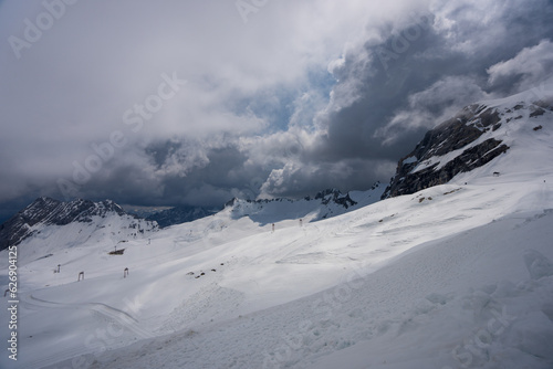 Overlooking the snow-covered ski facilities from the cable car. The Zugspitze belongs to the Alps and is the highest mountain in Germany. © twabian