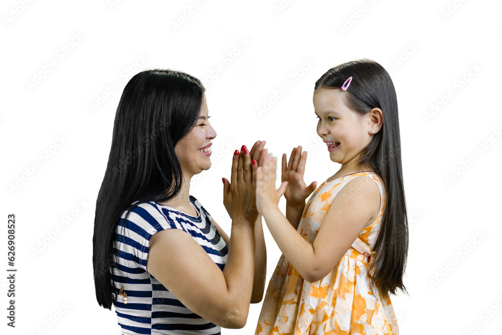 Young asian mother playing clapping game with her daughter. Isolated on white. Young asian mother playing clapping game with her daughter. Isolated on white.