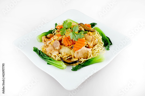 Pork Fried Noodle with carrot and Dwarf cabbage, evening street food in cambodia