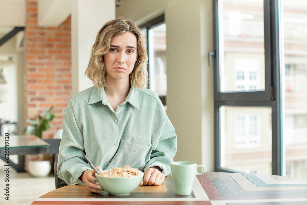 pretty woman feeling sad and whiney with an unhappy look and crying. breakfast bowl concept pretty woman feeling sad and whiney with an unhappy look and crying. breakfast bowl concept
