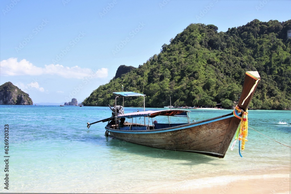 wooden boat on a beach in Asia 
