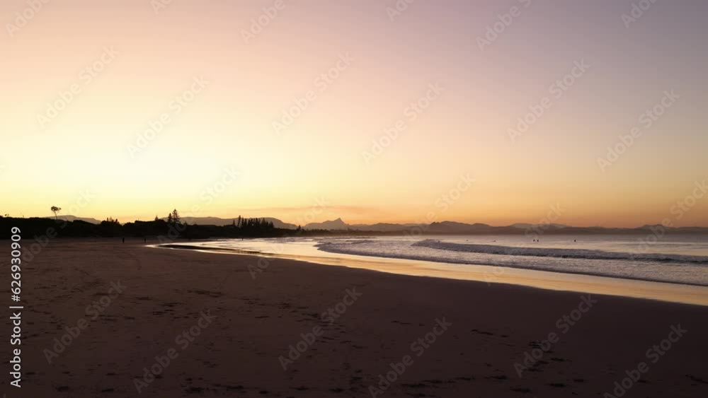 Sunset beach views across Main Beach in Byron Bay, New South Wales, Eastern Australia Sunset beach views across Main Beach in Byron Bay, New South Wales, Eastern Australia