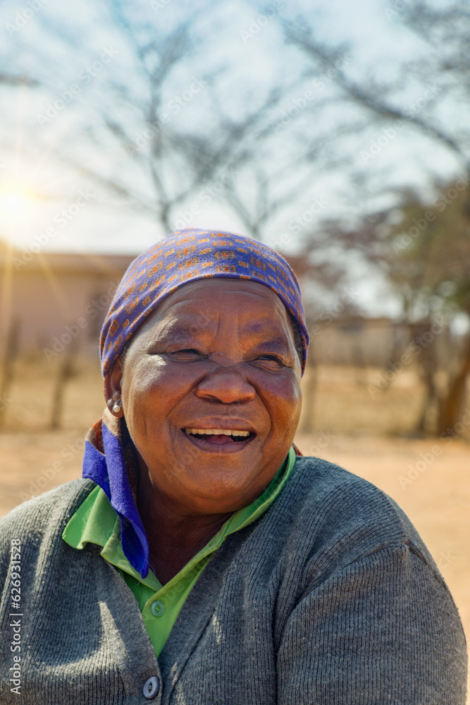 village life, old african woman in the yard laughing from the heart village life, old african woman in the yard laughing from the heart