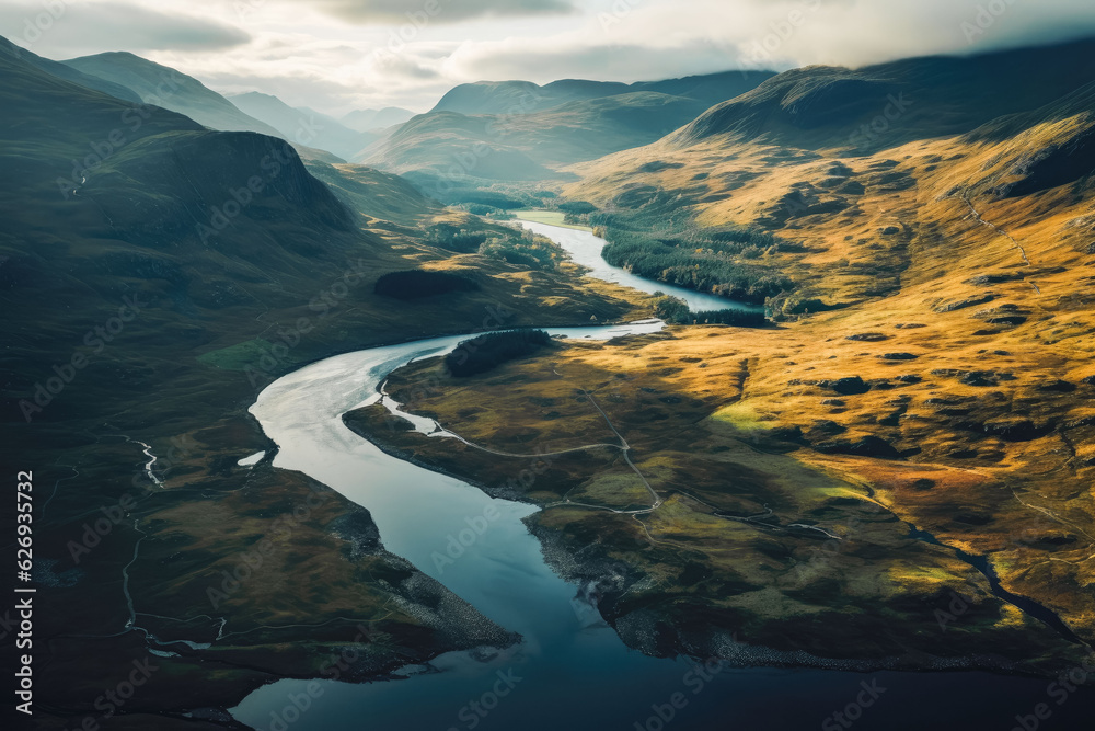 Fototapeta premium Aerial view of scottish highlands. Beautiful green nature and blue lakes.
