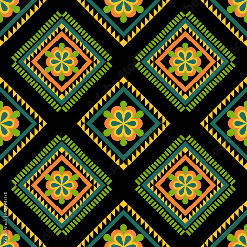Geometric ethnic pattern seamless flower color. seamless pattern. Design for fabric,curtain,background,carpet,wallpaper,clothing,wrapping,Batik,mandalas,fabric,Vector illustration. pattern style.